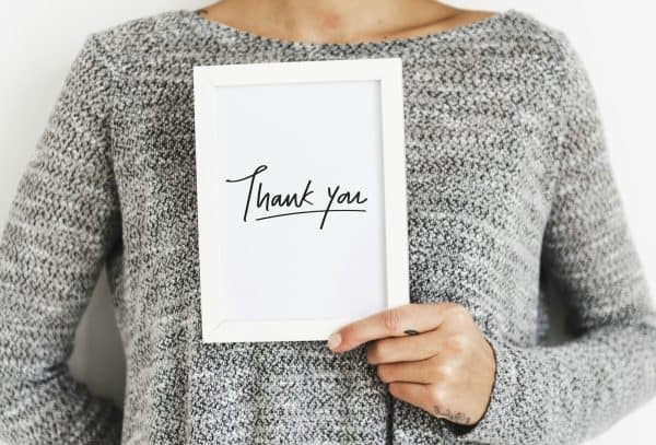 Mastering Intentionality in Networking: 3 Woman holding a Thank You card
